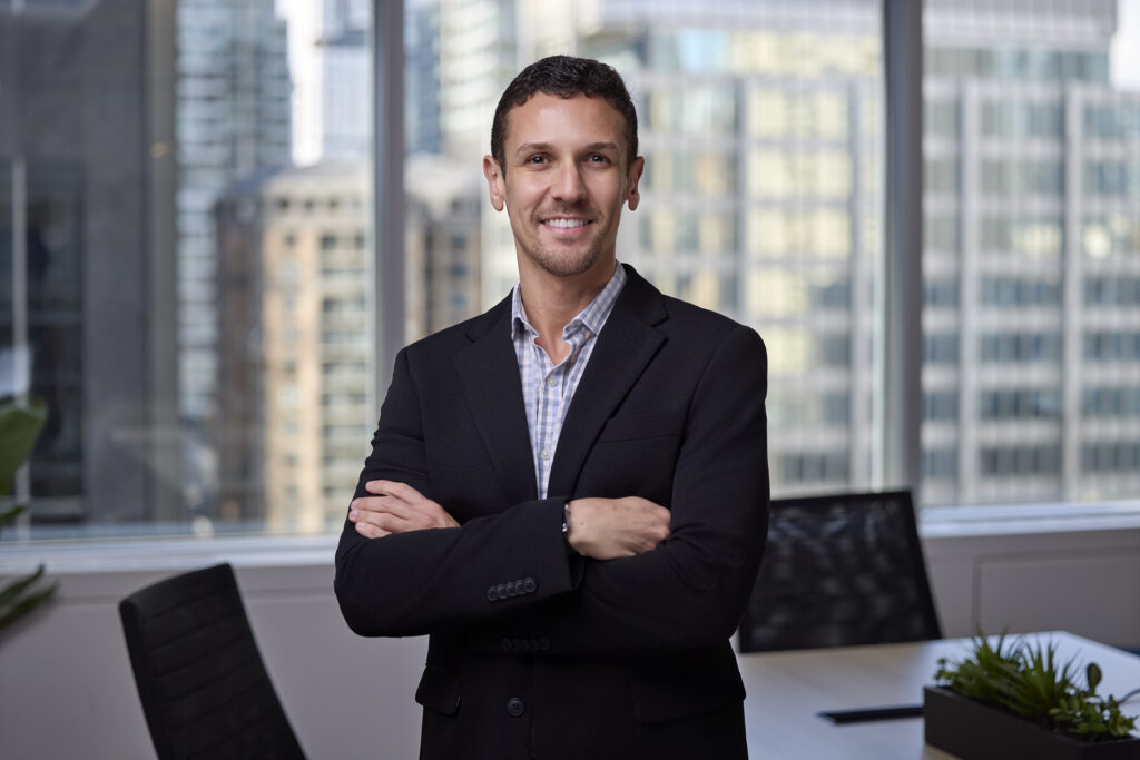 An image of Samuel Barros in the Our Family Office boardroom in Toronto Canada