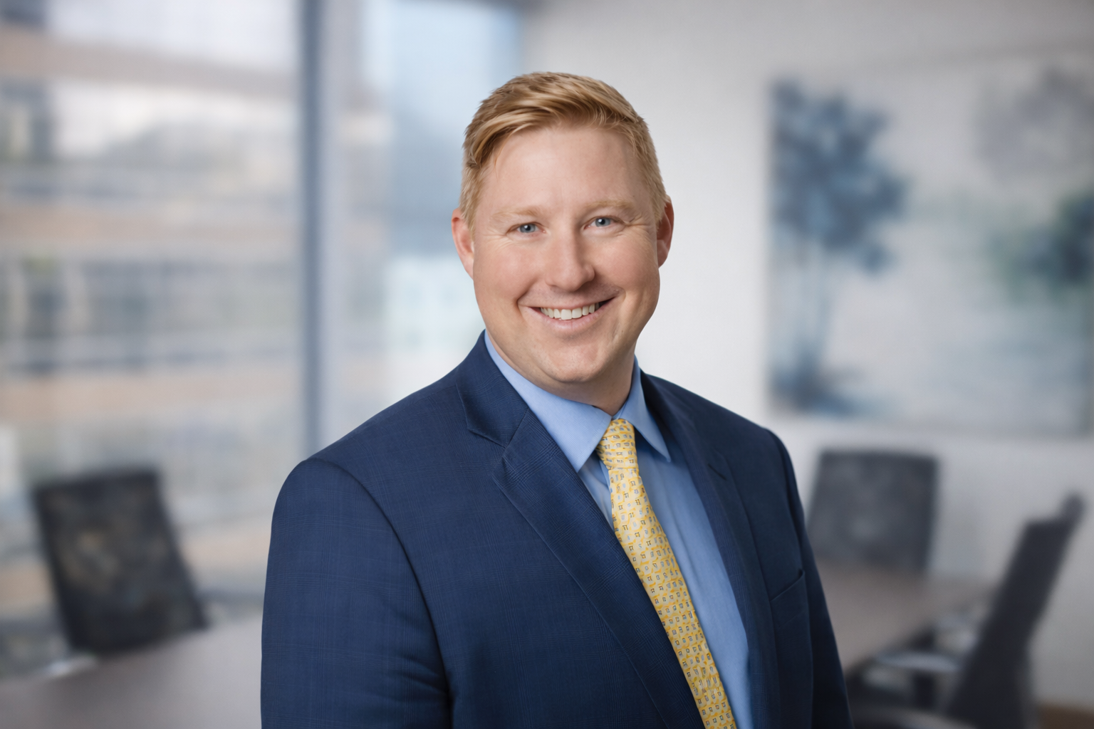 An image of Trevor Hunt in the boardroom at Our Family Office in Toronto Canada